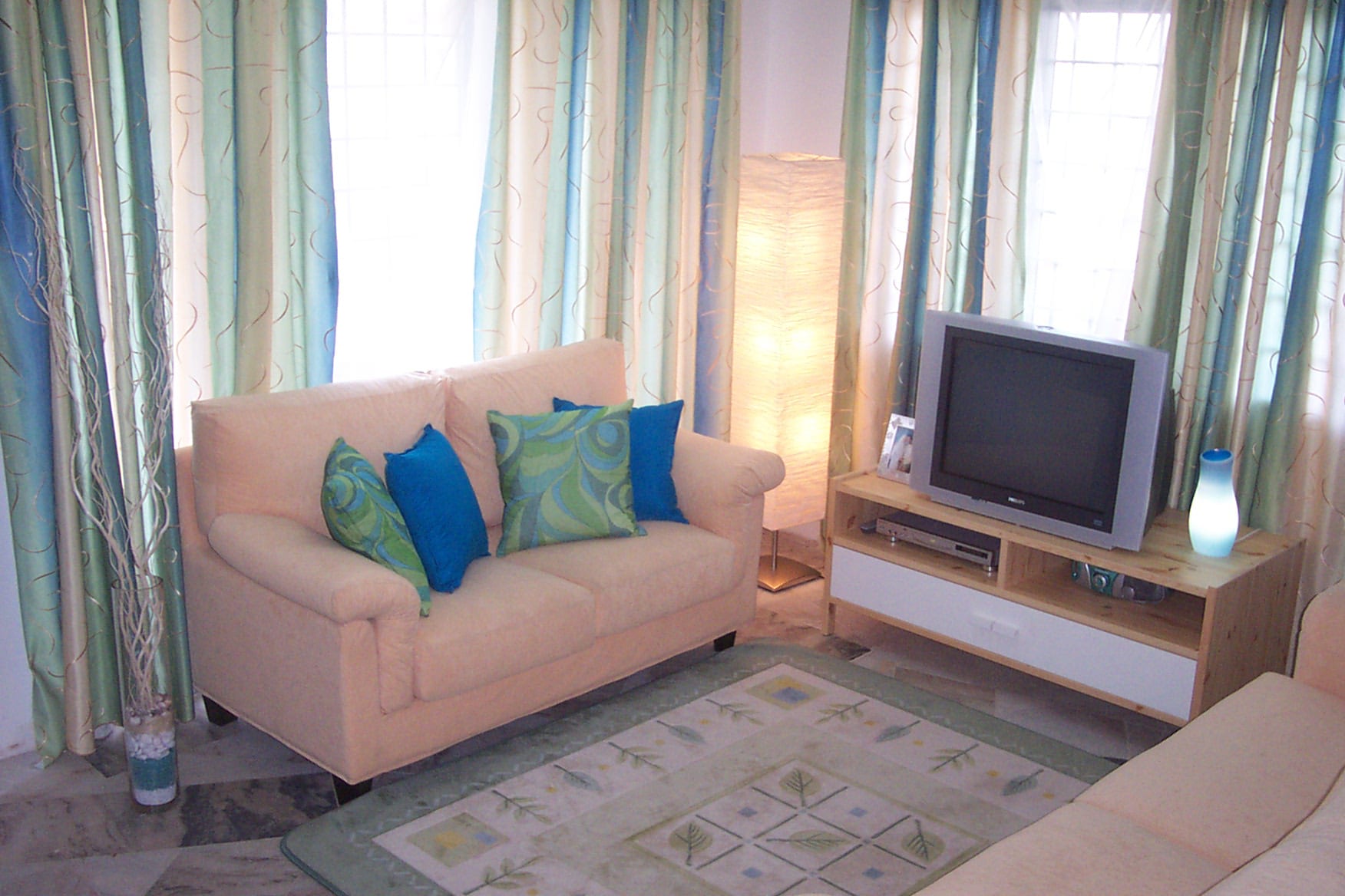 living room with pink couch