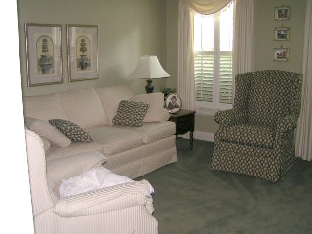 living room with white couches