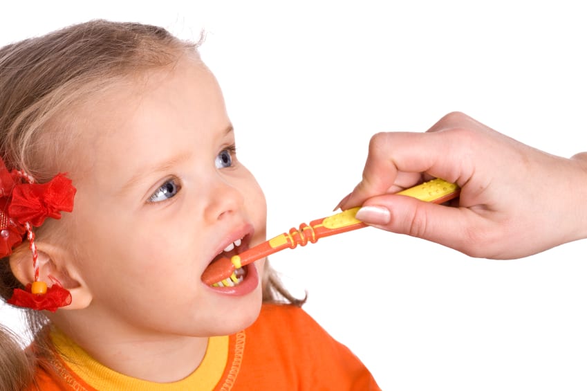 brushing child's teeth